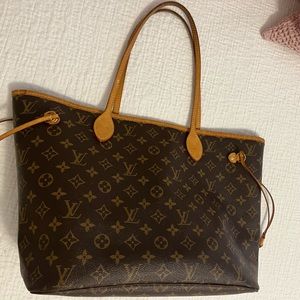Louis Vuitton Never Full MM with wristlet and box.